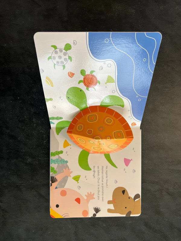 Livre en relief - à la plage