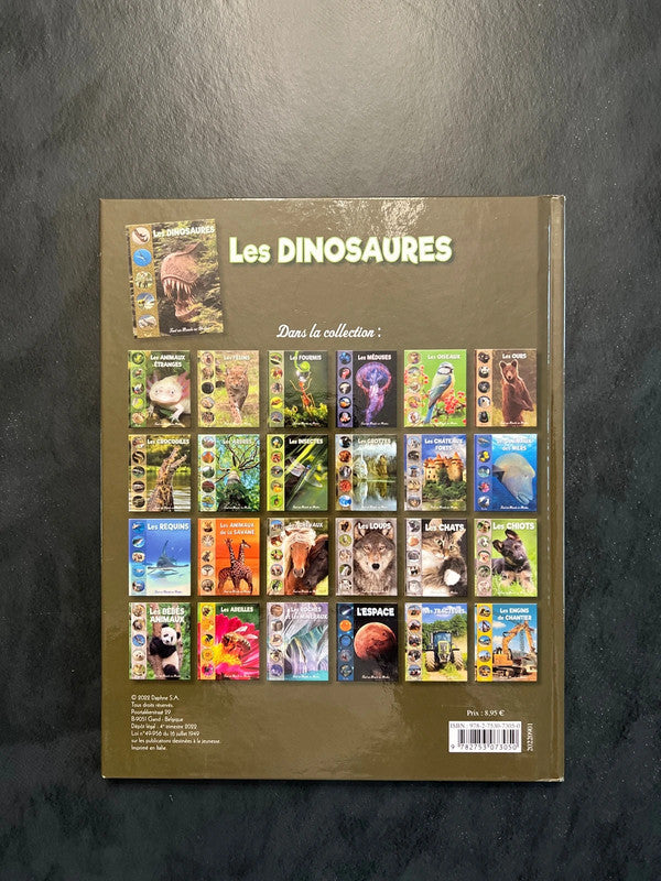 Livre tout un monde en photos - les dinosaures