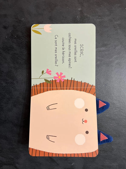 Livre cartonné - à qui sont ces oreilles - lapin